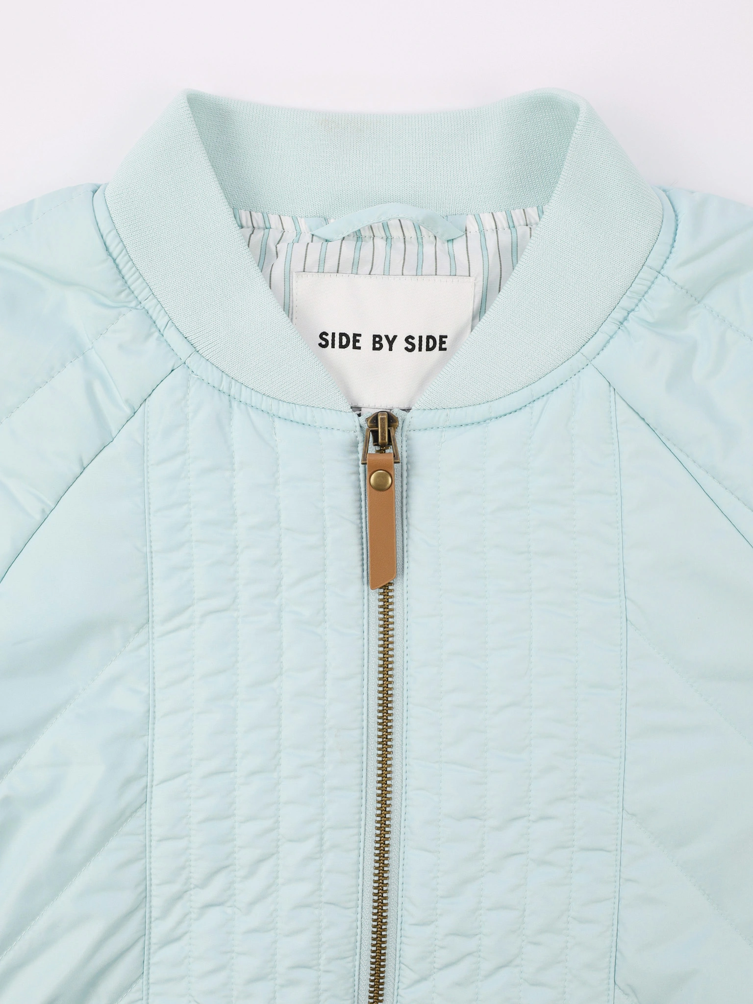 Пальто голубого цвета прямого кроя